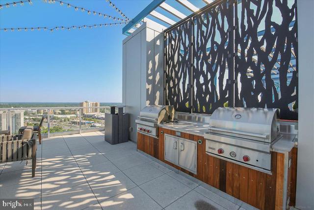 view of patio / terrace featuring an outdoor kitchen and grilling area