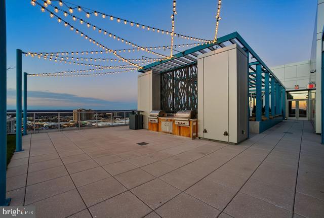 view of patio / terrace featuring grilling area and exterior kitchen