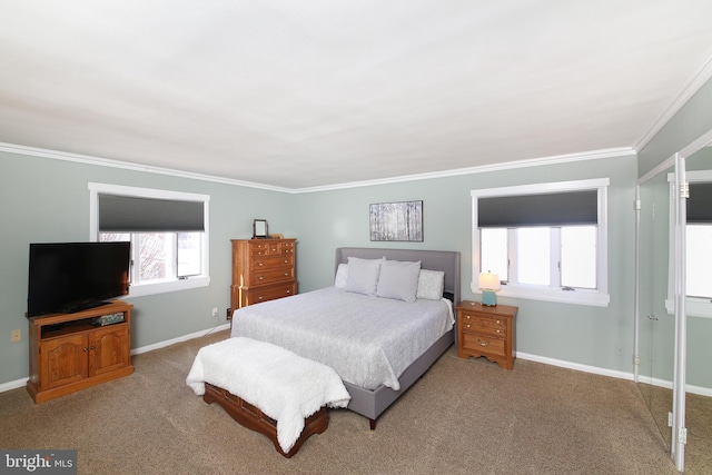 carpeted bedroom with baseboards and crown molding