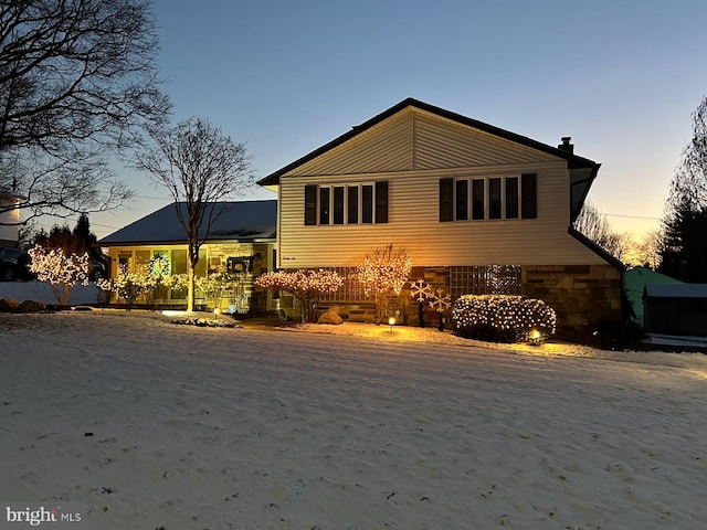 view of front of property featuring a chimney