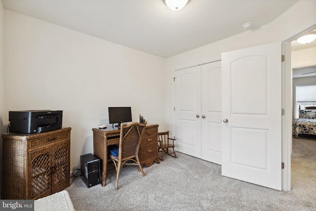 home office with carpet flooring