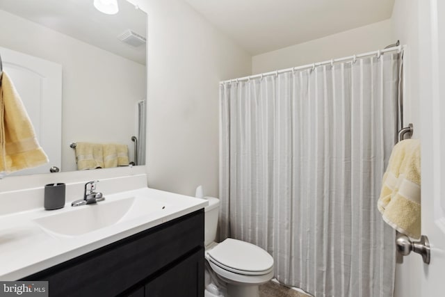 full bath with toilet, visible vents, and vanity