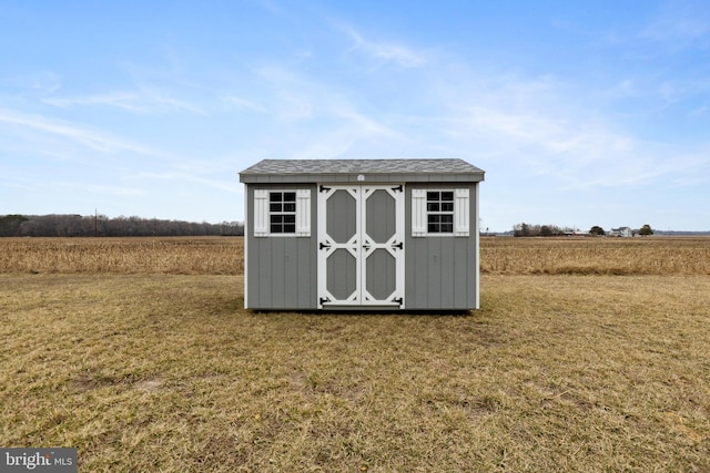 view of shed featuring a rural view