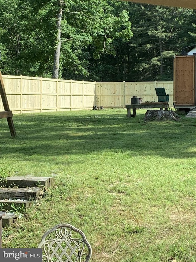 view of yard featuring fence