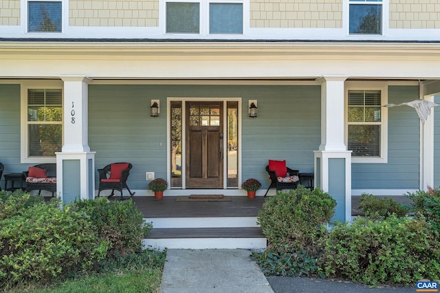 property entrance with covered porch