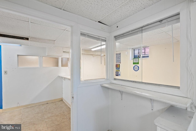 7310 Alaska Ave NW, Washington, DC 20012 - spacious closet with light tile patterned floors and a paneled ceiling