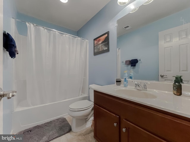 bathroom featuring tile patterned flooring, toilet, vanity, visible vents, and shower / bath combination with curtain