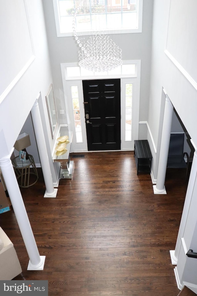 210 Potomac Ridge Dr, Fort Washington, MD 20744 - entryway with baseboards, dark wood-type flooring, and a towering ceiling