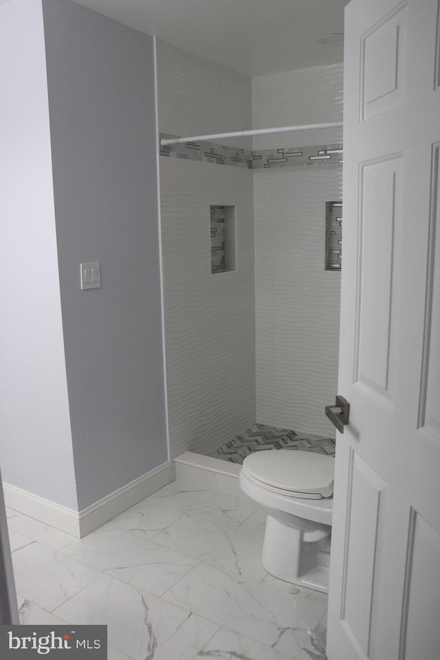 210 Potomac Ridge Dr, Fort Washington, MD 20744 - bathroom with marble finish floor, toilet, a shower stall, and baseboards