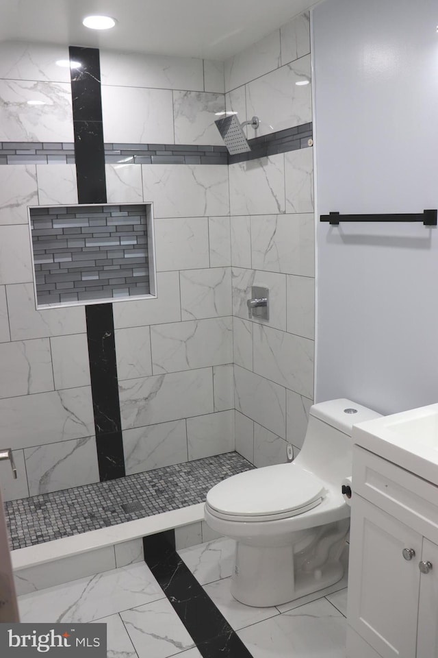 210 Potomac Ridge Dr, Fort Washington, MD 20744 - full bath featuring vanity, toilet, marble finish floor, and a tile shower