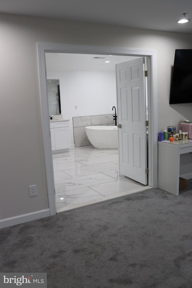 210 Potomac Ridge Dr, Fort Washington, MD 20744 - bathroom with baseboards, a freestanding bath, and marble finish floor