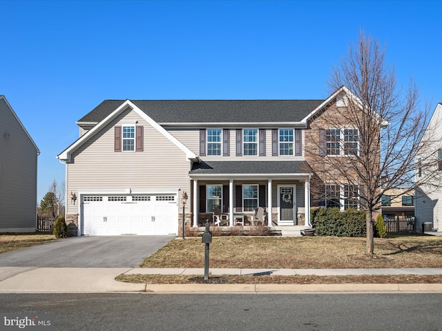 view of front of property with aphalt driveway, a porch, fence, roof with shingles, and an attached garage