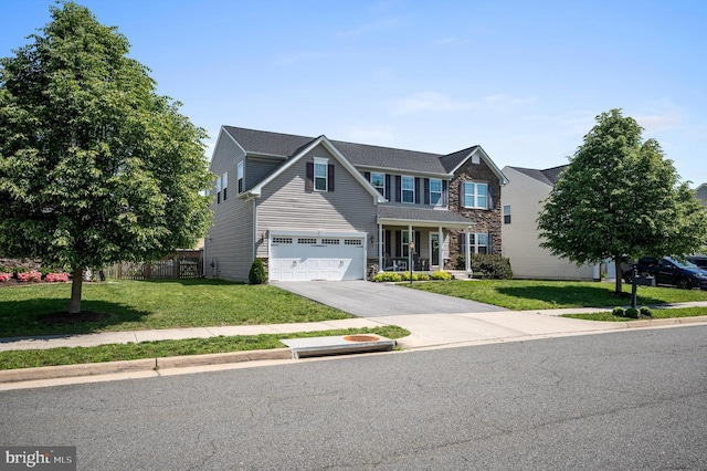 traditional home featuring stone siding, concrete driveway, and a garage