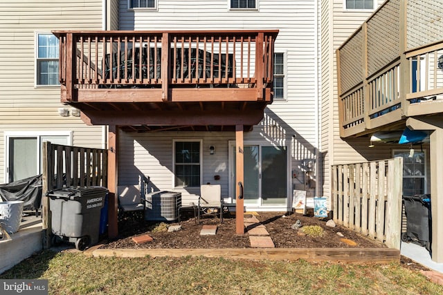 back of property with central air condition unit