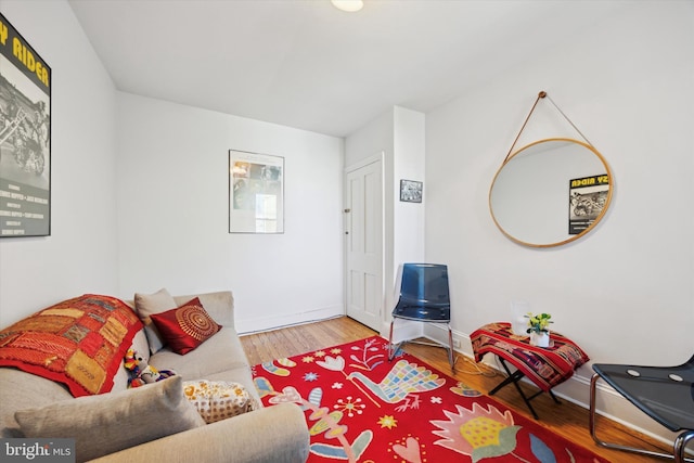 living room with wood finished floors and baseboards