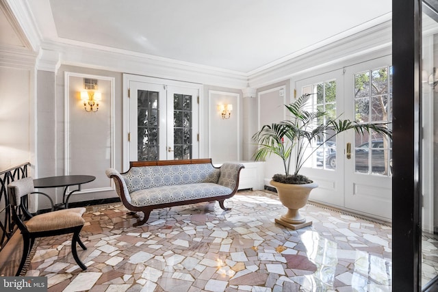 sunroom / solarium featuring french doors