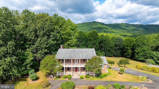 drone / aerial view with a view of trees