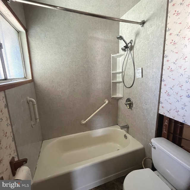 full bathroom with bathing tub / shower combination and toilet