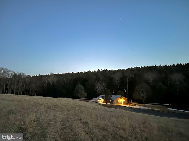 view of nature with a rural view and a wooded view