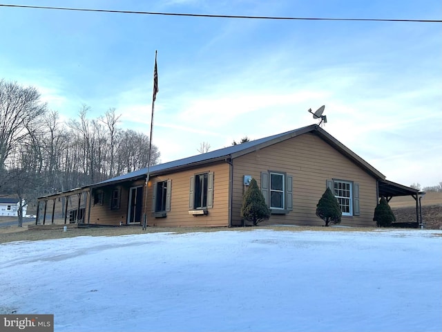 view of snow covered property