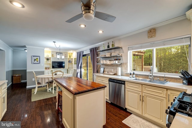 kitchen with stainless steel dishwasher, black range with gas stovetop, ornamental molding, a sink, and wood counters