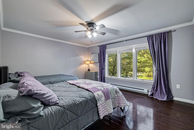 bedroom with hardwood / wood-style flooring, a baseboard radiator, ornamental molding, and baseboards