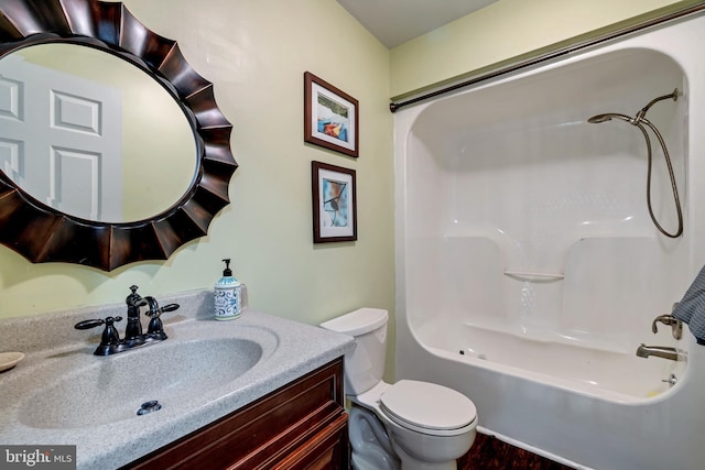 full bath with toilet,  shower combination, and vanity