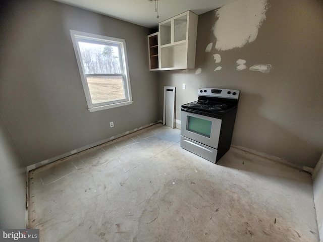 kitchen featuring electric range oven and open shelves