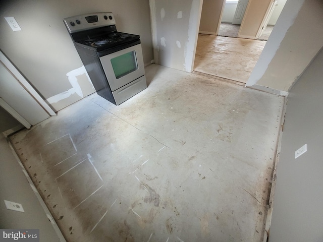 kitchen featuring stainless steel range with electric stovetop and unfinished concrete flooring