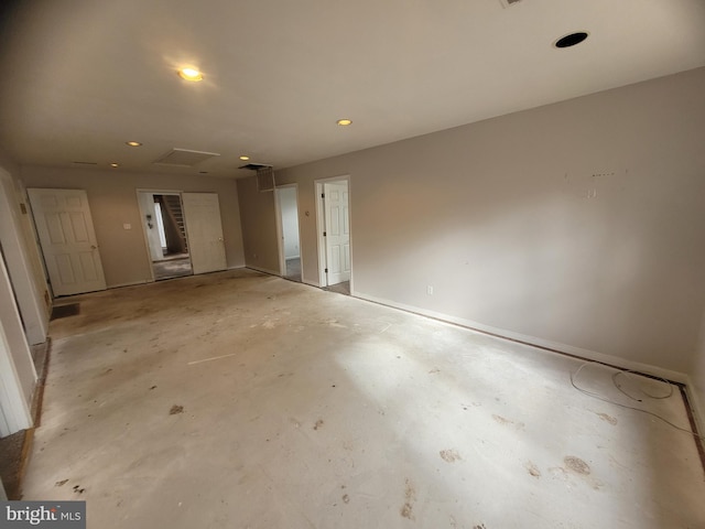 unfurnished room featuring recessed lighting and unfinished concrete flooring