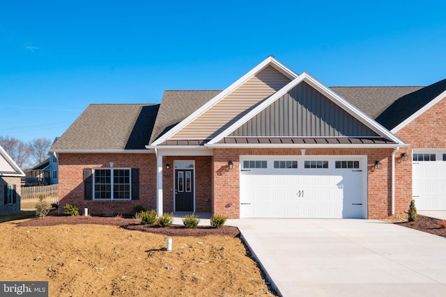 view of front of home featuring driveway, roof with shingles, an attached garage, fence, and brick siding