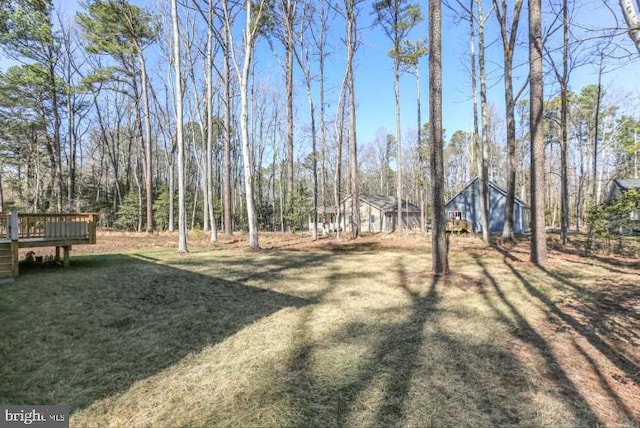 view of yard with a deck