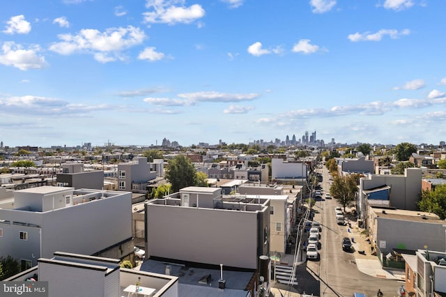 drone / aerial view featuring a city view