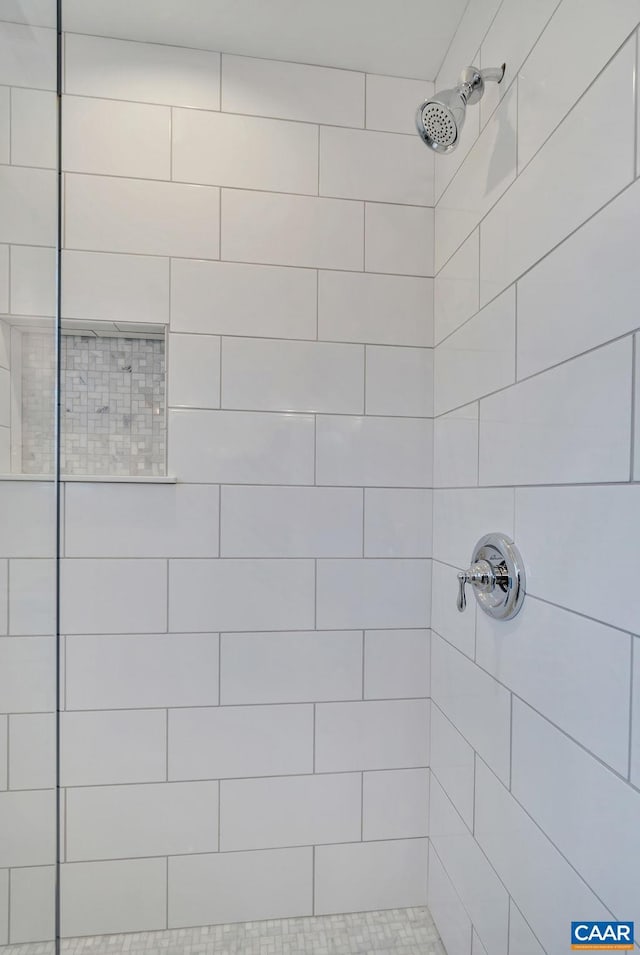 details featuring a tile shower