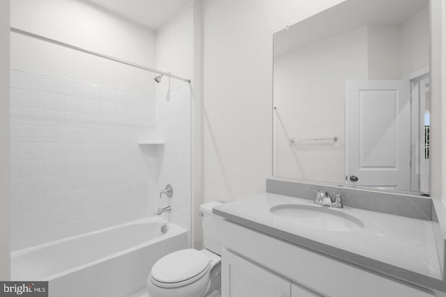 full bath with toilet,  shower combination, and vanity