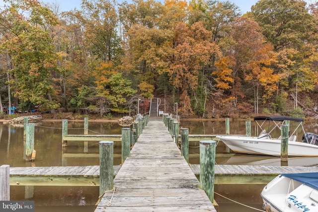 view of dock with a water view