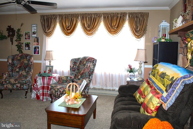 living area featuring carpet, a ceiling fan, and crown molding