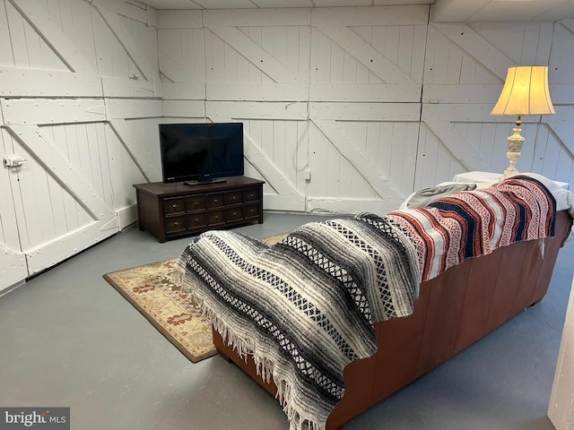 living area with concrete flooring