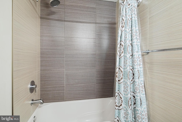 full bathroom featuring shower / bath combination with curtain