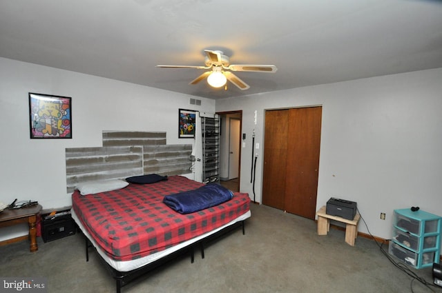 bedroom featuring ceiling fan, a closet, carpet, and visible vents