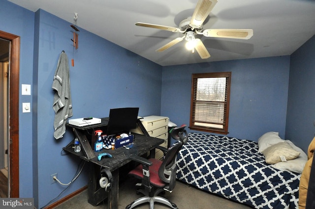 bedroom with ceiling fan and carpet flooring