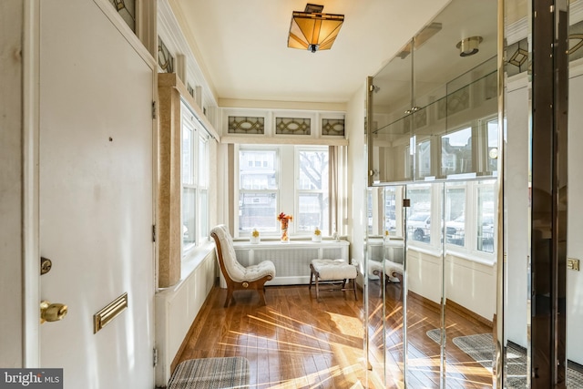 sunroom with radiator heating unit