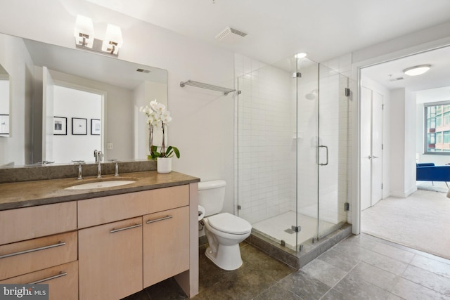 full bathroom with toilet, a stall shower, vanity, and visible vents