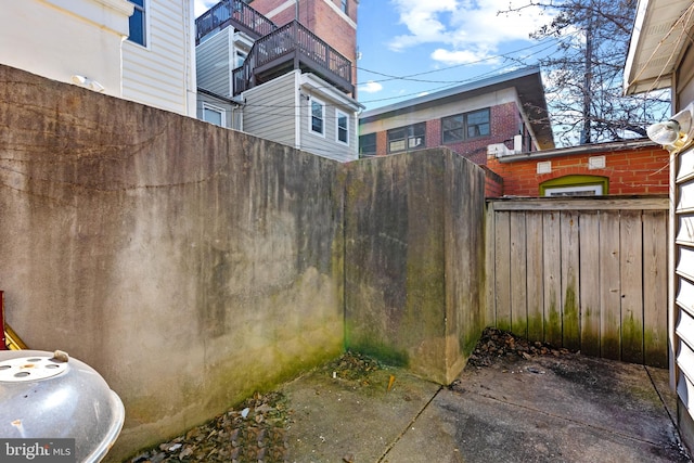 view of yard with fence and a gate