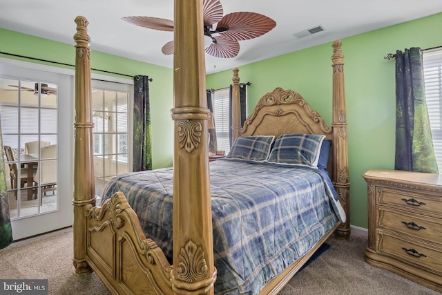 bedroom featuring ceiling fan, carpet floors, and visible vents