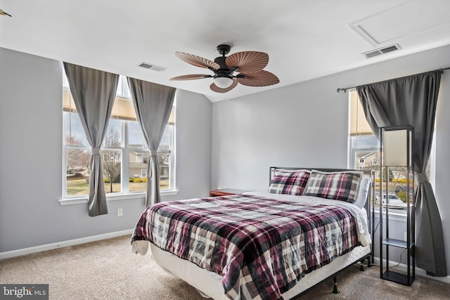 bedroom featuring a ceiling fan, carpet, visible vents, and baseboards