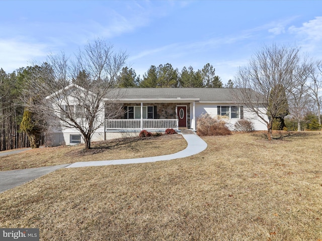 single story home with covered porch and a front lawn