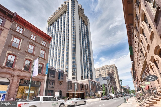 view of property with a city view