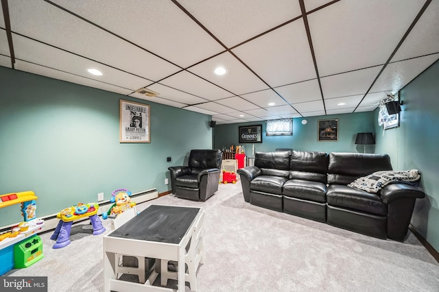 carpeted living area with recessed lighting, a paneled ceiling, and baseboards