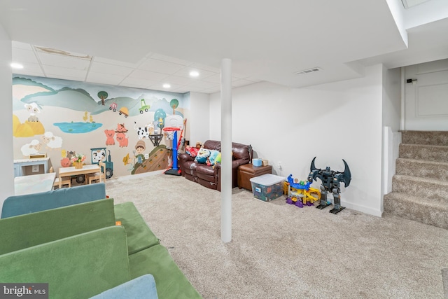 rec room with carpet floors, a paneled ceiling, recessed lighting, visible vents, and baseboards